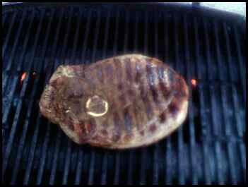 Grilling lamb steaks. cooking lamb on gas grill